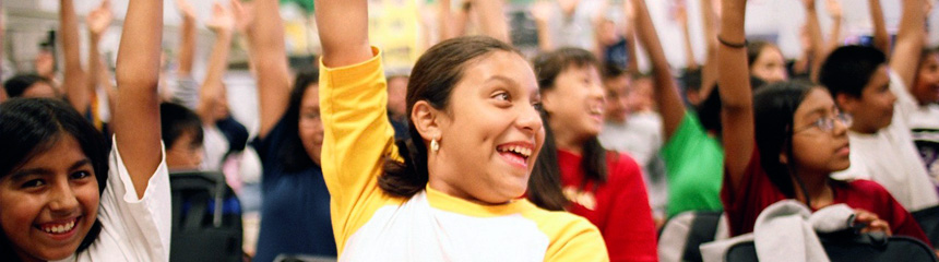 Campers raising their hands